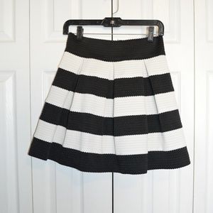 black and white striped, pleated skirt